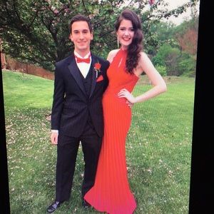 Red beaded lace prom gown